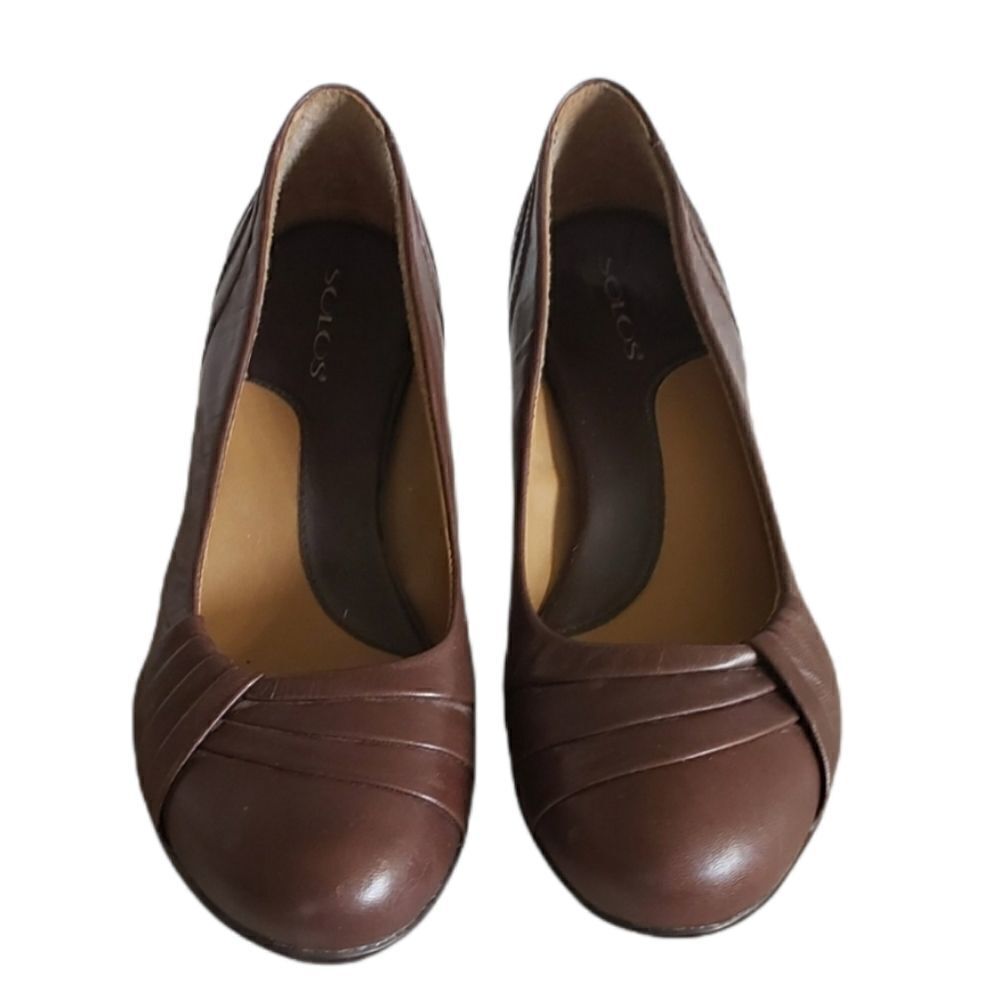Brown slip on Kitten Heel by Solos size 8